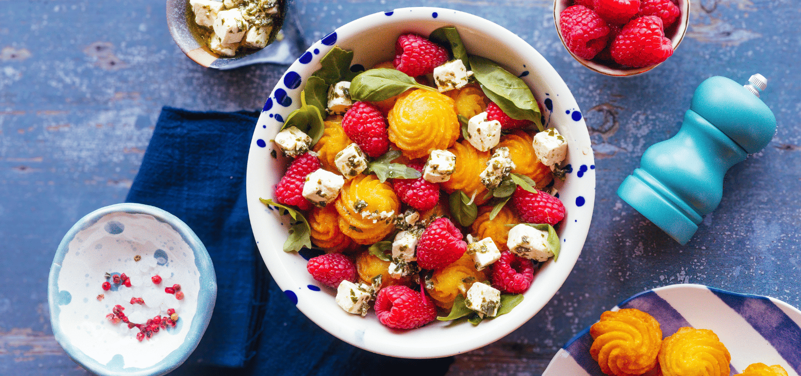 Elegant Pom’ Duchesse rosettes with raspberries and feta cheese