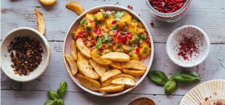 Aromatic Pati Parts Garlic wedges with sweet and spicy mango salsa