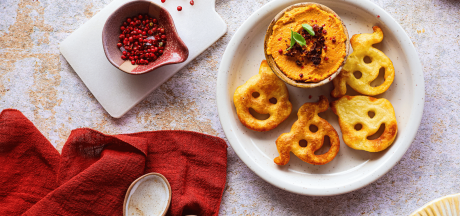Cheerful Pom' Patati faces with roasted carrot hummus