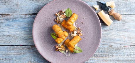 AVIKO Pom' croquettes served with four cheese sauce and roasted walnuts