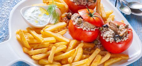 Tomatoes stuffed with smoked mackerel, pearl barley, capers, olives with AVIKO Super Crunch Original fries and tzatziki sauce