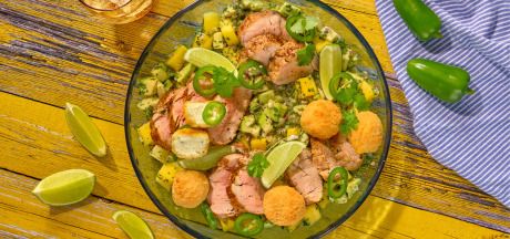 Sweet-spicy salad with mango, avocado, pork tenderloin and AVIKO Jalapeño Balls