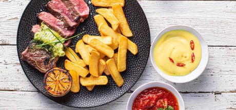 Grilled entrecote served with Steak Fries and homemade sauces